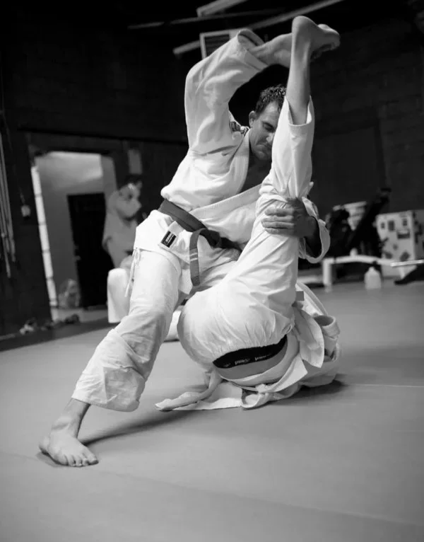 Michael Graeber rolling with another jiujitsu practitioner.