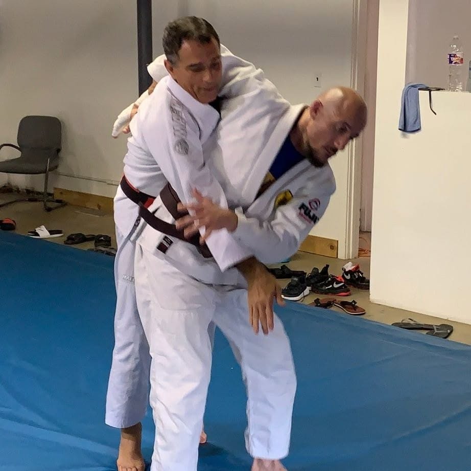 Sean Liebig practicing a throw on Royler Gracie.